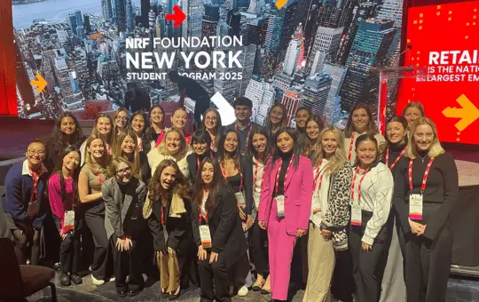 group of students in new york city at a conference